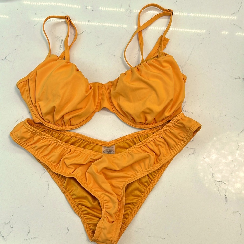 Kittenish orange bikini
